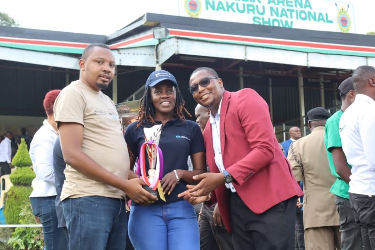 Staff Holding pictures